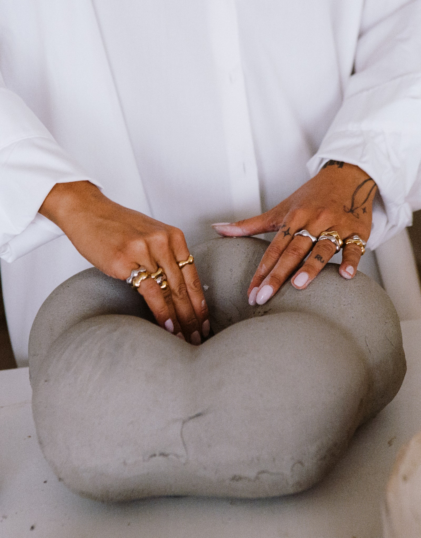 Images may contain accessories jewelry ring adult body parts finger hands and symbols